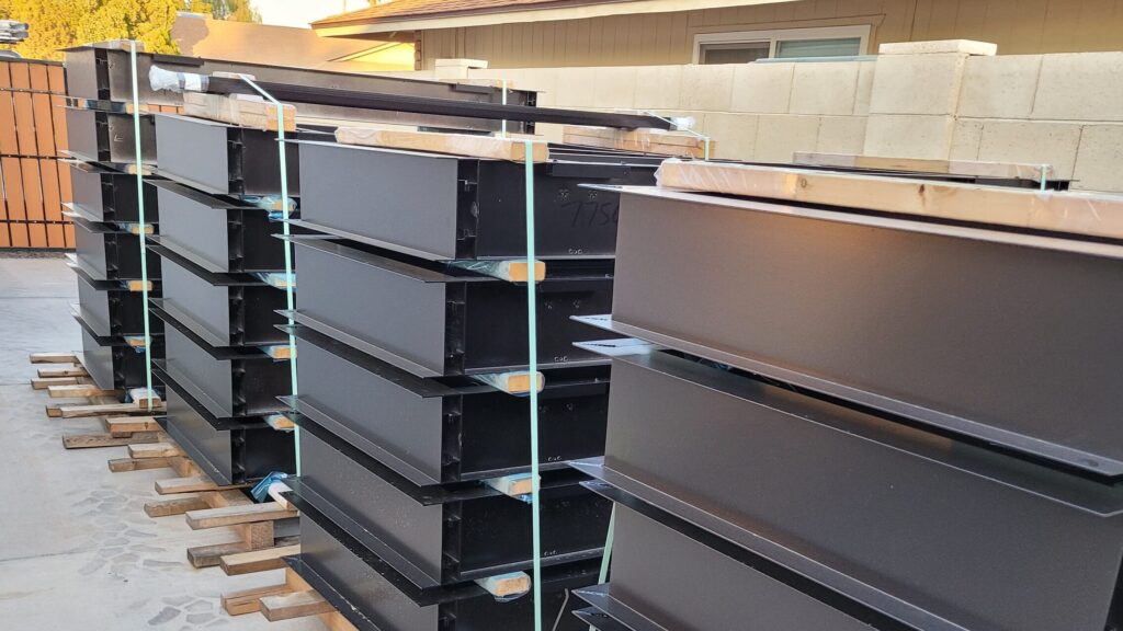 Glendale, Arizona. 21 tieback supported aluminum canopies ready for installation. 